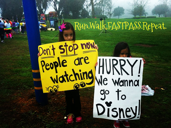 Kid Running Signs At A Race #18: Kid running signs at a race #18: Don't stop now. People are watching. Hurry. We wanna go to Disney.