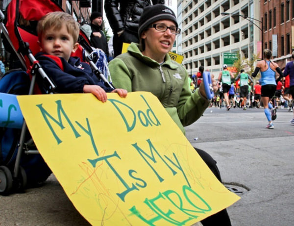 Kid Running Signs At A Race #15: My dad is my hero.