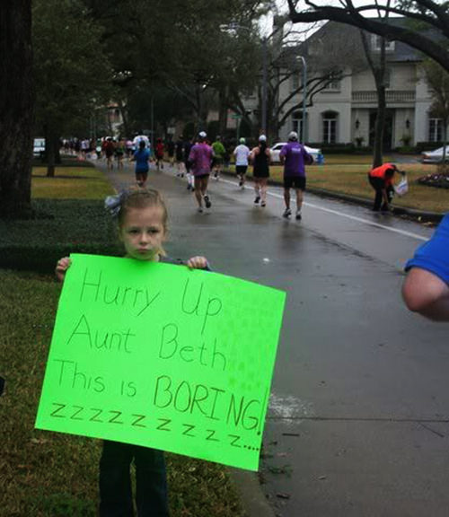 Kid Running Signs At A Race #13: Hurry up, Aunt Beth. This is boring. Zzzzzzzz.