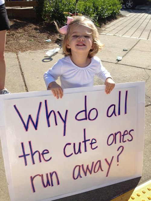 Kid Running Signs At A Race #12: Why do all the cute ones run away?