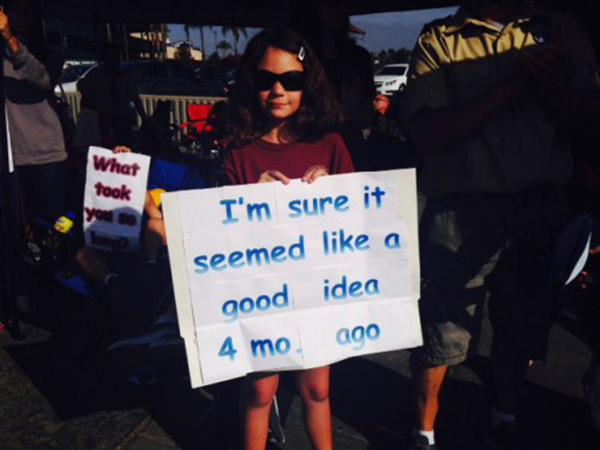 Kid Running Signs At A Race #4: I'm sure it seemed like a good idea 4 months ago.