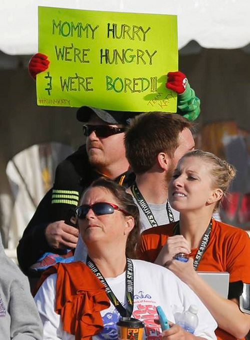 Kid Running Signs At A Race #2: Mommy, we're hungry. And we're bored.