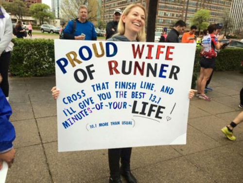 Sexy Running Signs At A Road Race #7: Proud wife of runner. Cross that finish line and I'll give you the best 13.1 minutes of you life. 10.1 more than usual.